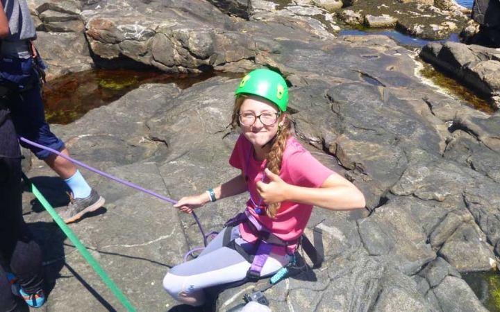 girls learn to rock climb in maine